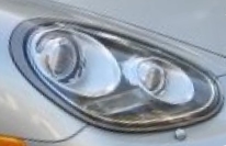 Ксеноновые фары Porsche Cayman S - оптика с поворачивающимися линзами Фары автомобиля Porsche Cayman S с линзами и ксеноновыми лампами